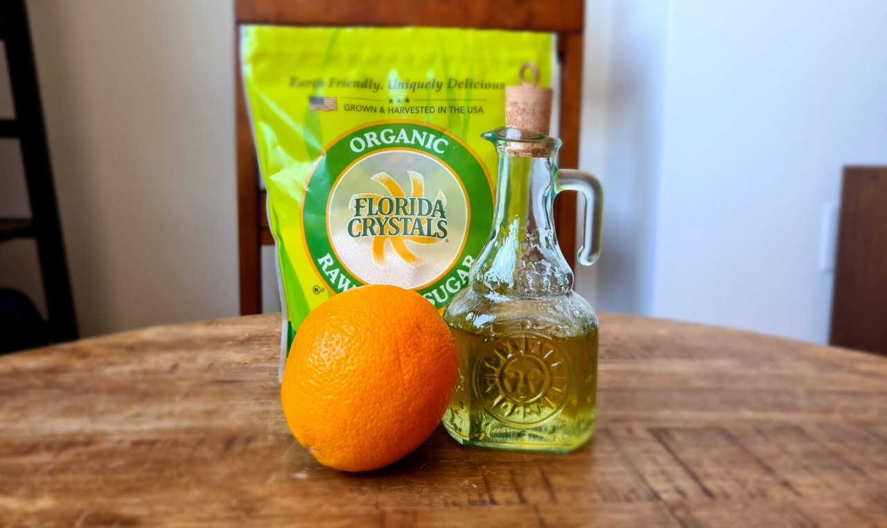 Orange Simple Syrup In pouring bottle